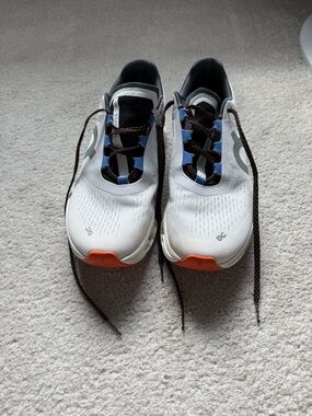 On Running Women’s  Cloudmonster Running Shoes - White with Orange Accent